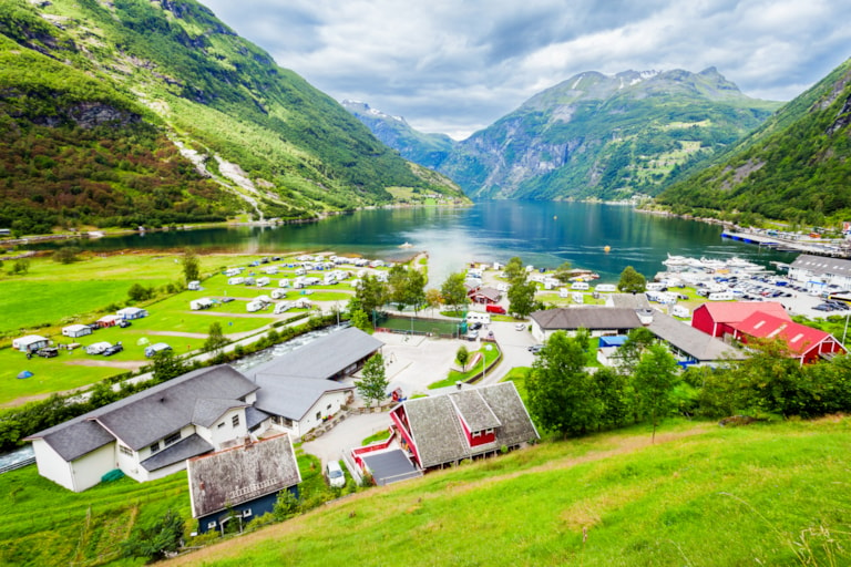 Geiranger is a small tourist village in Sunnmore region of Norway. Geiranger lies at the Geirangerfjord
