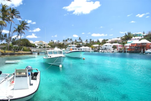 Yacht boats on blue sea water in tropical lagoon in Hamilton, Bermuda. Summer vacation and travelling. Luxury lifestyle concept