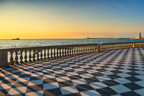 Mascagni Terrazza terrace belvedere seafront and harbour entrance at sunset. Livorno Tuscany Italy Europe