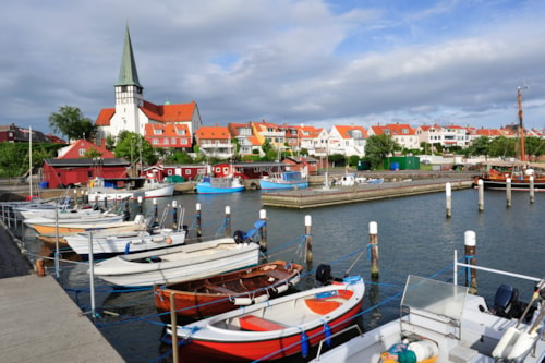 Marina and white church in Ronne, Bornholm, Denmark