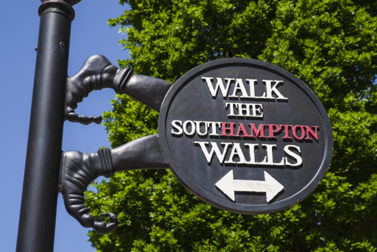 A sign in Southampton marking the route and location of the historic City Walls.
